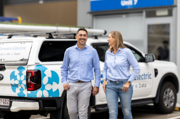 Dylan and Kristine Dawson, founders of Dawson Electric, standing in front of a branded work vehicle in Brisbane | How We 5x'd Dawson Electric's Google Ads Conversion Rate
